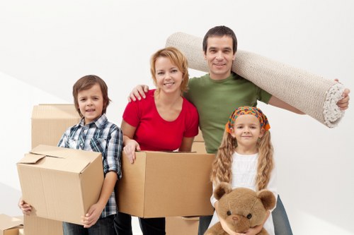 Variety of furniture items ready for pick-up in Mayfair storage
